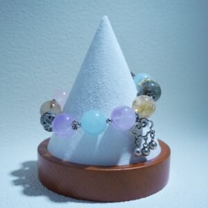 Lumoola 5-Element Crystal Bracelet reflecting sunlight