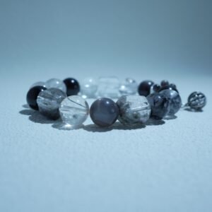 Black Obsidian beveled bracelet for grounding energy, associated with the Root Chakra and the Water/Earth Element for protection.